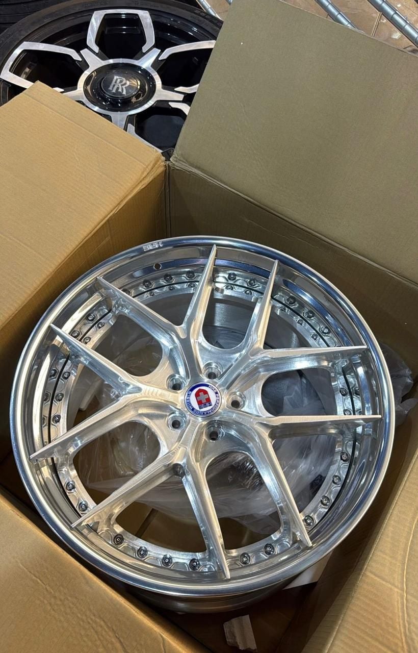Polished HRE forged wheel prepared for fitment